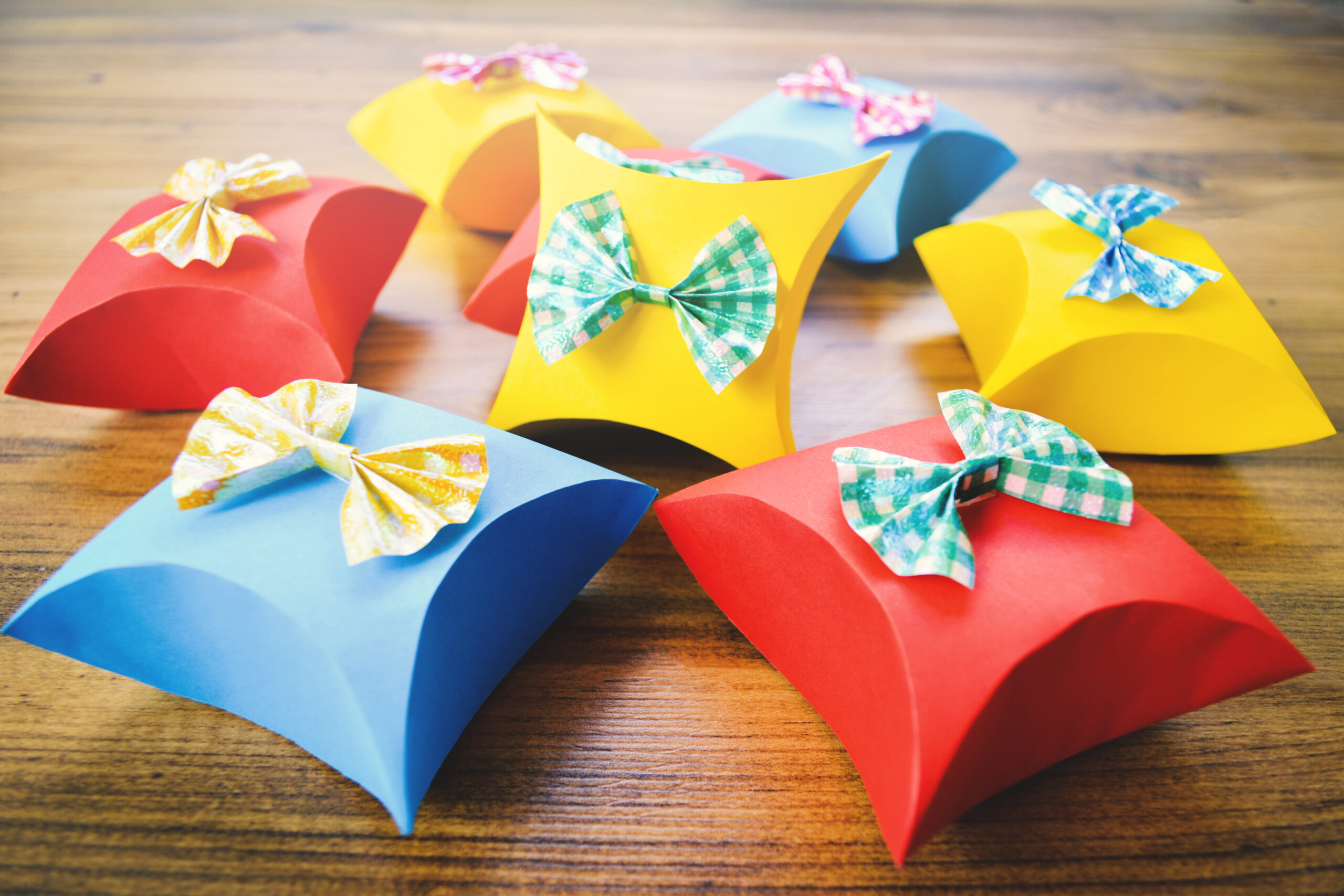 close-up-colorful-gift-boxes-wooden-table