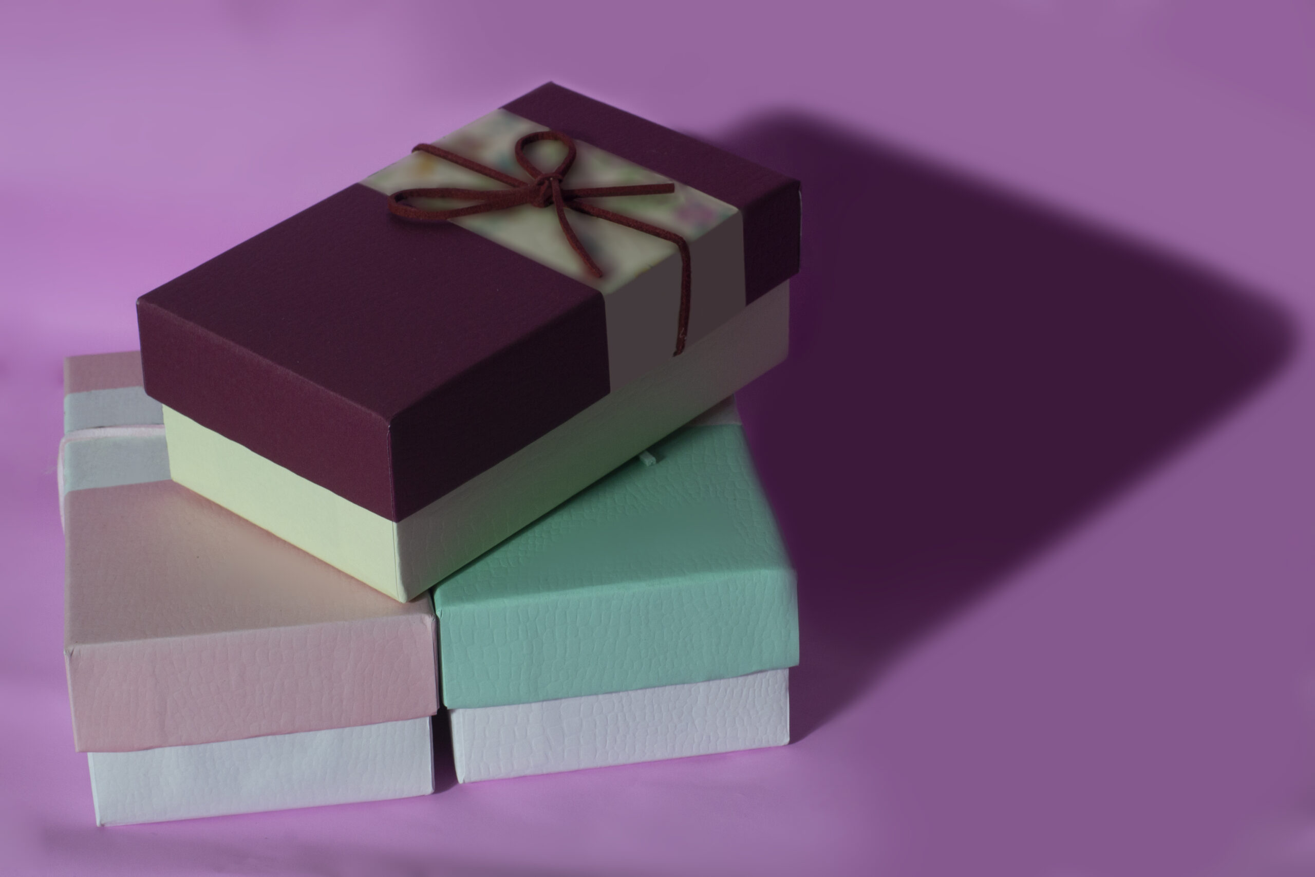 A gift box on the pink background